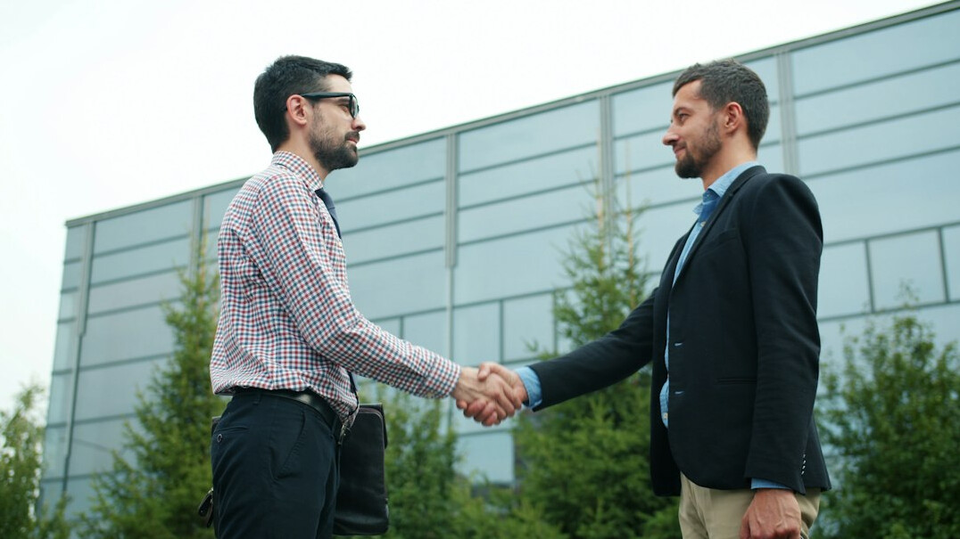 professional handshake deal