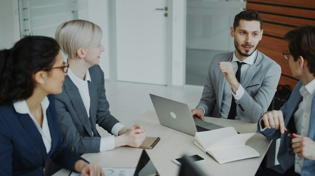 manager leading meeting